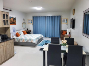 Stay at VERDANT by Camella Manors Deluxe King Bed with Balcony, Swimming Pool & Gym
